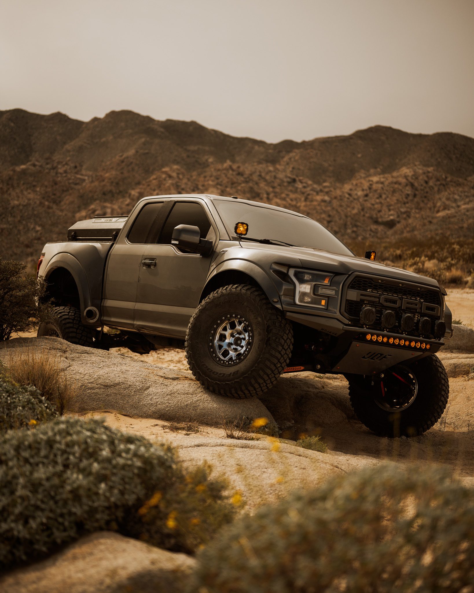 Ford Raptor rooftop tent with 23ZERO Armadillo Horizon mounted on bed rack