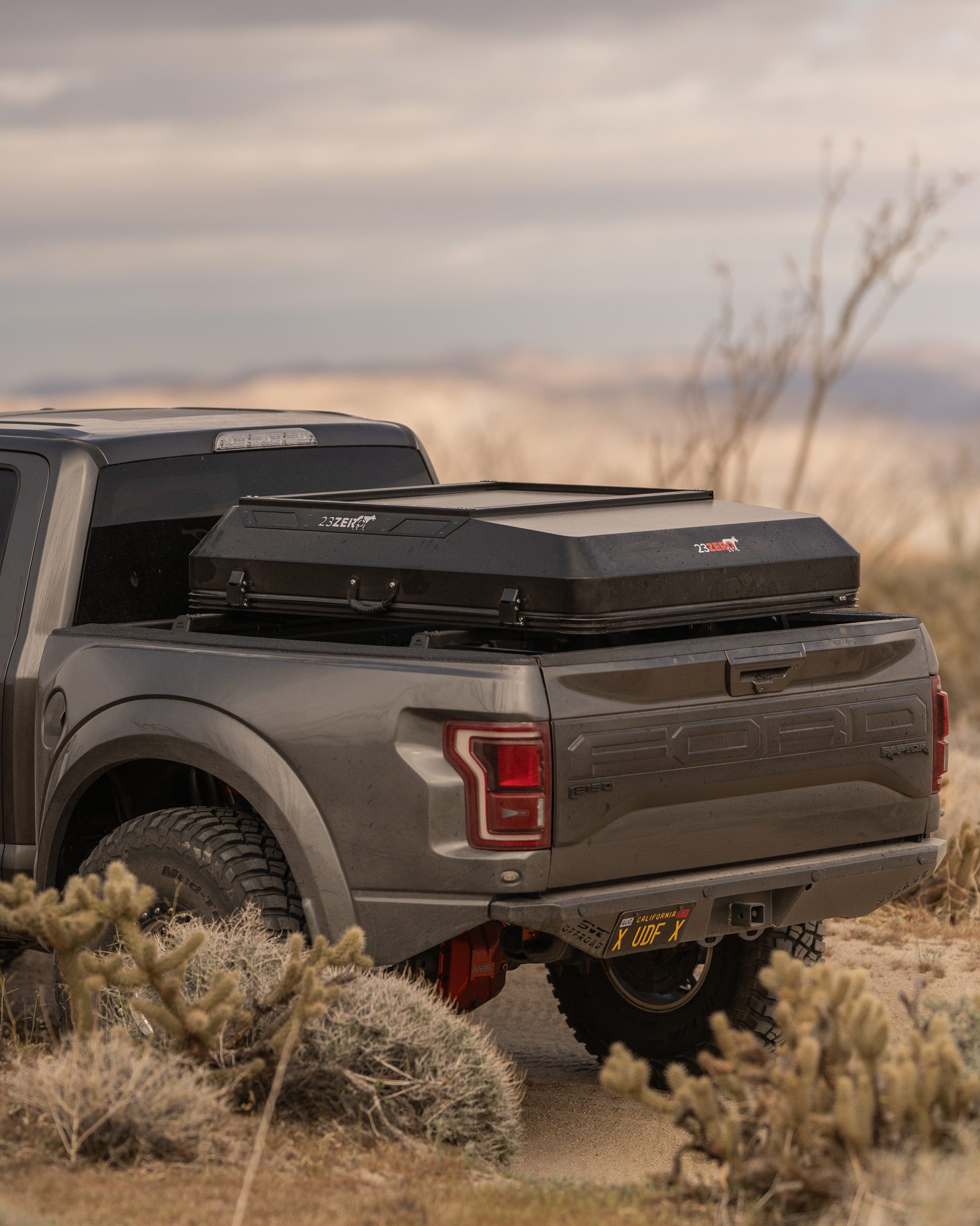 Best rooftop tent for Ford Raptor showing clean hard shell truck setup