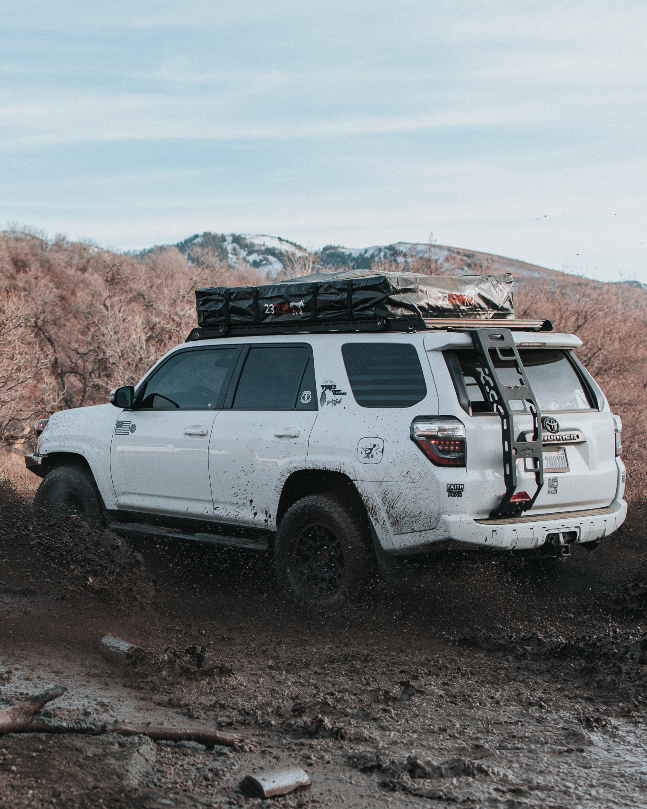 4Runner in Mud with 23Zero Walkabout Soft Shell Rooftop Tent